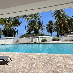 relaxing-beach-condo-5-mins-from-airport.top-hotels-puertorico.com/